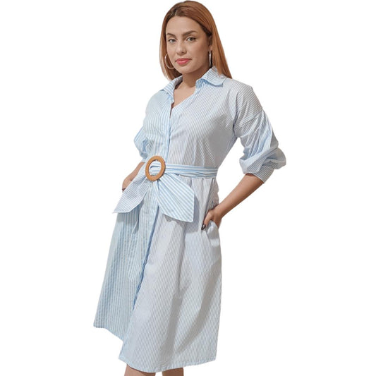 A woman wearing a blue striped midi shirtdress with front button closures, a self-tie belt waist, long sleeves, and a point collar.